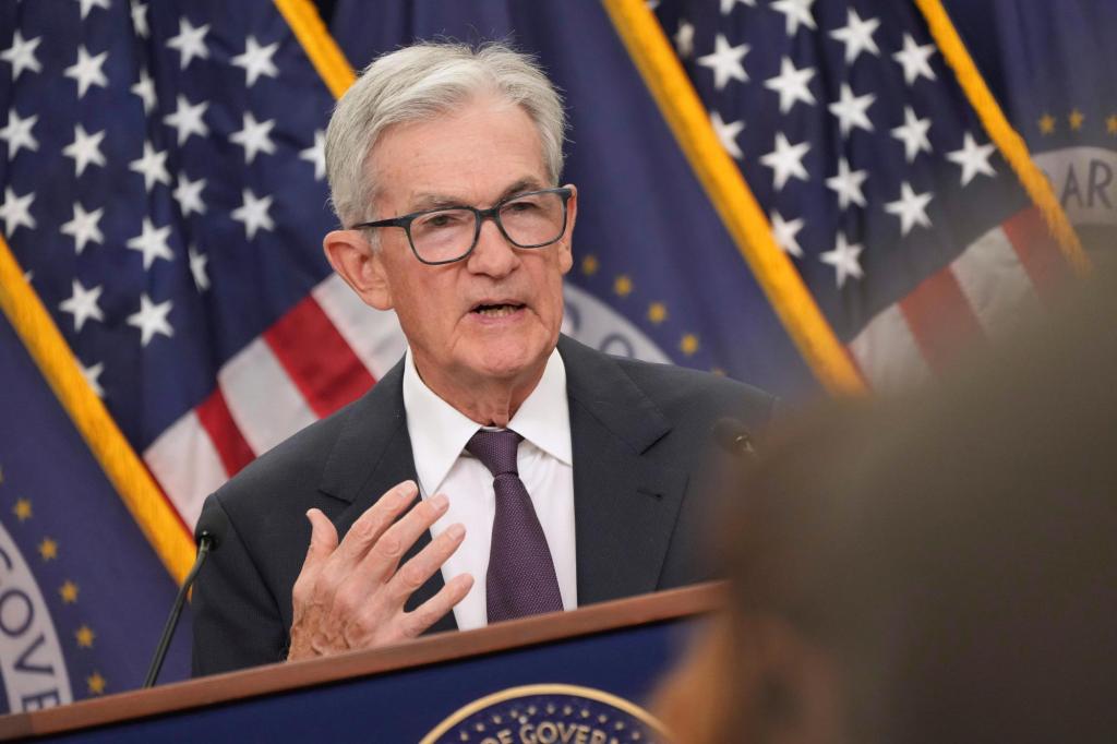 Powell signals Federal Reserve to move slowly on interest rate cuts